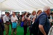 Attendees line up to meet authors at book signings