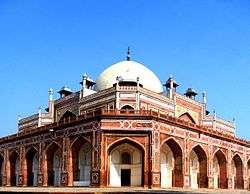 Humayun's tomb (reddish coloured against the sky