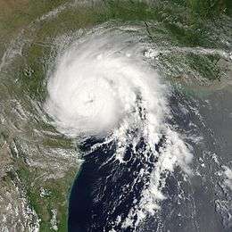 View of the storm from Space on July 15, 2003. The roughly circular storm is about to make landfall in Texas. Mexico and Louisiana are seen to the south and north, respectively.