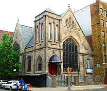 A church with tower less tall than the gabled roof