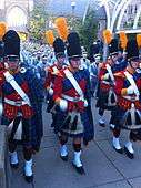 The Irish Guard leading the Band of the Fighting Irish to the stadium