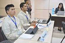 Delegates attending a committee session