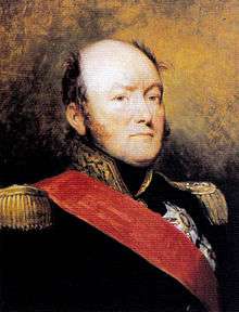 Painting shows a round-faced man with a mostly bald head. He wears a dark blue military uniform with epaulettes and a red sash.