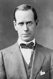 Black and white formal portrait of Joseph Medill McCormick in 1912