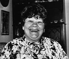 Black and white photo of Joy Cowley smiling