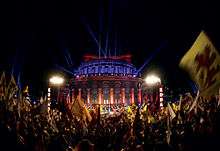 The audience of KOHAR waving the flags of the Kingdom of Cilicia, Liberty Square, Yerevan, 2011 alt text