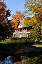 Building and pond in autumn