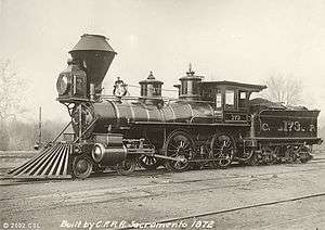 A black-and-white image of an old steam locomotive and tender bearing a resemblance to the DRR's No. 1 locomotive and tender