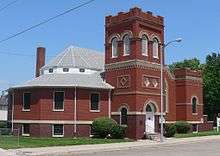 Brick building with square-topped tower