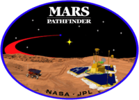 An image inside an oval, depicting two spacecraft, one a lander, and one a rover, on the surface of Mars. The words "Mars Pathfinder" are written on the top and the words "NASA · JPL" are written on the bottom.