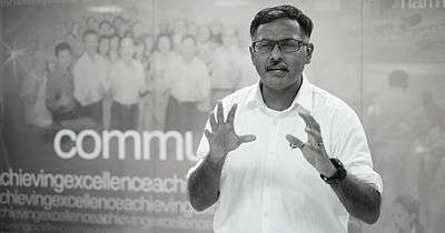 Pillai giving a speech