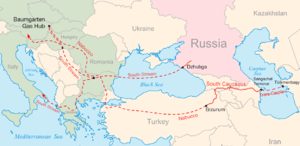 atlas like image of some countries in different colours with some continuous and interrupted red lines