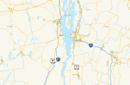 NY 373 is an east–west route south of Plattsburgh that connects US 9 to the west shore of Lake Champlain. A ferry links the east end of NY 373 to Burlington, Vermont.