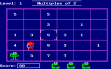 A screenshot from the Number Munchers game (DOS version) showing the muncher and a troggle monster in the playfield.