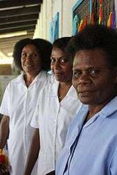 photograph of three nurses