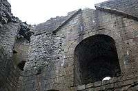 A window in a stone wall.