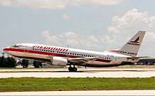 Aircraft takeoff.  Twinjet airliner tilted as it leaves the runway.