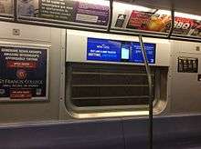 The interior of an R160 car, number unknown, with an experimental LCD screen