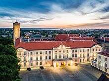 Toompea Castle pink stucco three story building with red hip roof