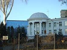 Large white domed building with pillars