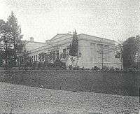 A white Neoclassical school building