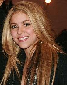 Shakira smiling.