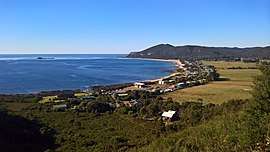 Overlooking Sisters Beach from west with a view of Sisters Island and the Two Sisters peak.