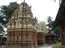 Ornate, tan pyramidal stone temple