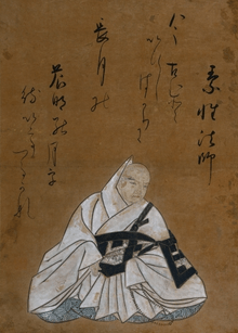 A Japanese monk in a ceremonial white robe