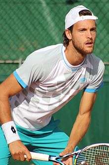 João Sousa prepares to return a serve during the 2015 French Open