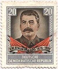 head shot of man with moustache on postage stamp