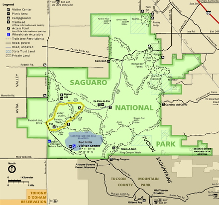 Map of the TMD, an irregular squarish shape colored green and surrounded by brown or gold-shaded areas not in the park