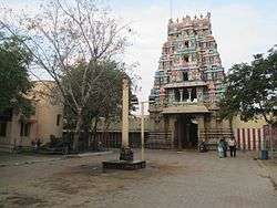 Image of a temple with its pyramidal entrance tower