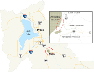 Map showing an area of Utah County circled and enlarged to the southeast of Utah Lake. The enlarged area shows an abandoned rail and highway grades to the west and south of replacement rail and highway grades.