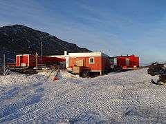 Photo of an outpost surrounded by snow.