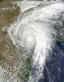 Satellite image of a tropical cyclone well inland. The storm is still very organized and has banding features.