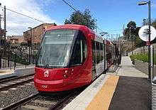 Red and white tram.