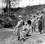 Fishing at the old mill pond on Young’s Creek; photo taken spring 1958.