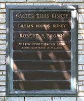 A gravestone inscribed 'Walter Elias Disney', 'Lillian Bounds Disney', 'Robert B. Brown', Sharon Disney Brown Lund ashes scattered in paradise'