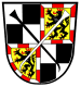 Quartered, first and third: Party per cross argent and sable; second and fourth: Or, a lion rampant sable, armed langued and crowned gules, bordured gyronny argent and gules; overall a Reuthaken sinister sable and a Reuthaken argent