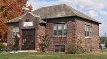 One-story brick building, built ca. 1915 in Carnegie library style