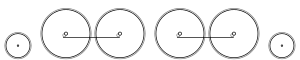 Diagram of one small leading wheel, four large driving wheels in two pairs, each pair joined by coupling rods, and one small trailing wheel