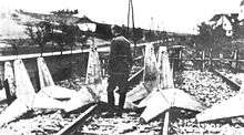 Railway tracks with concrete and barbed wire obstacles placed across them